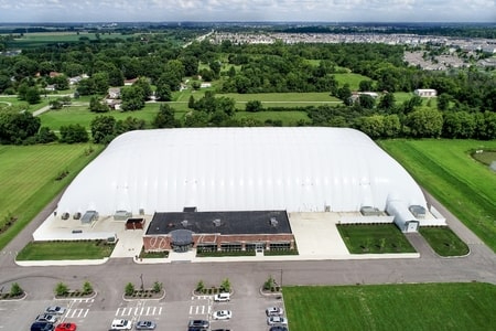 Large sports dome and the parking lot
